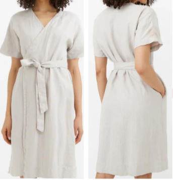 Front and back view of a woman wearing a solid beige 100% pure linen wrap midi dress with a V-neckline and tie belt.