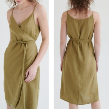 Front and back view of a woman wearing a solid earthy khaki mustard-olive brown 100% pure linen sleeveless wrap midi dress with a waist tie belt.
