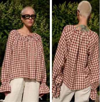 Front and back view of a women's long-sleeve blouse in a rust brown and cream gingham plaid pattern, featuring a relaxed wide neckline, softly gathered shoulders, and elasticated ruffled cuffs.