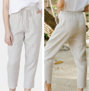 Front and back view of a woman showcasing solid oatmeal beige 100% pure linen relaxed-fit trousers with an adjustable drawstring elastic waistband.