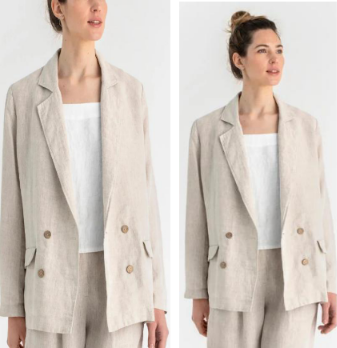 Front view of a woman showcasing a sophisticated oatmeal beige 100% pure linen matching suit set featuring a relaxed double-breasted blazer with buttons and matching straight-leg trousers.