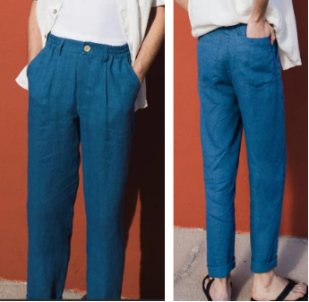 Front and back view of a woman showcasing solid ocean blue 100% pure linen casual loose-fit trousers with a comfortable gathered elastic waistband.